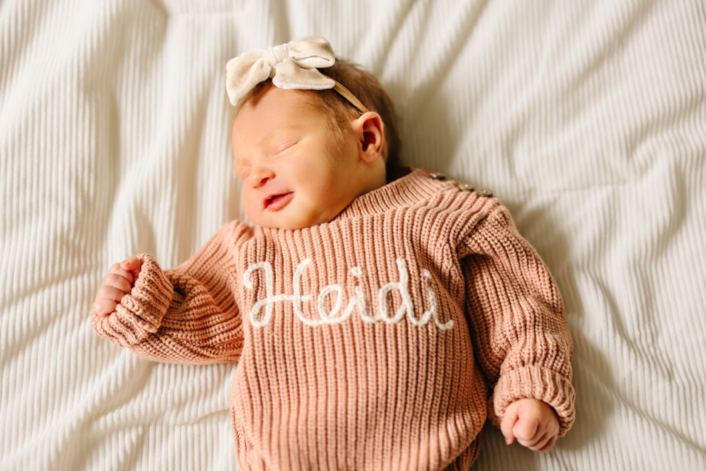 Bright bedroom with natural light during an in-home newborn session.